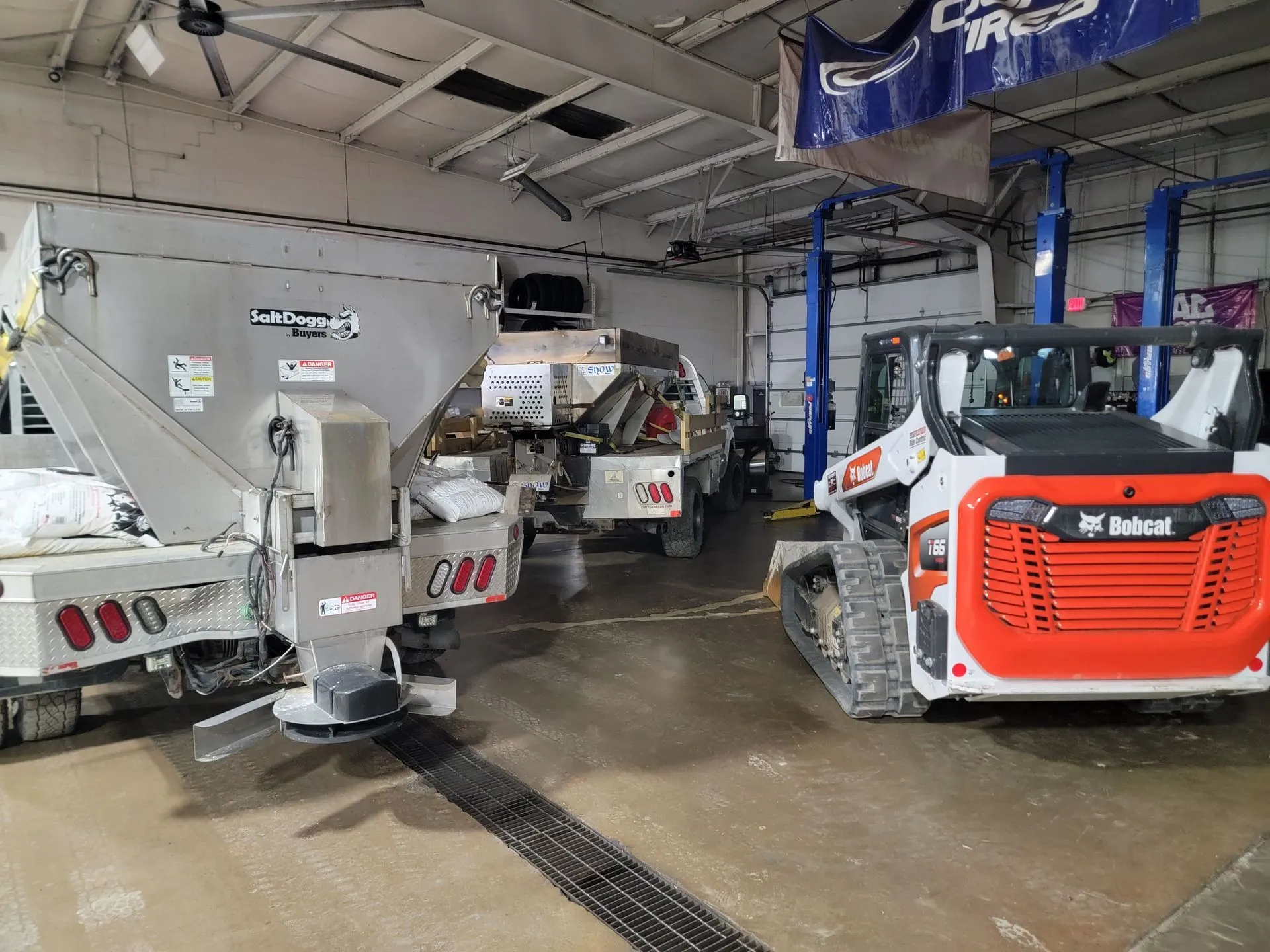 5 Points Landscaping Bobcat and equipment fleet in the shop